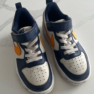 Nike Kids is Blue and Gold Sneakers